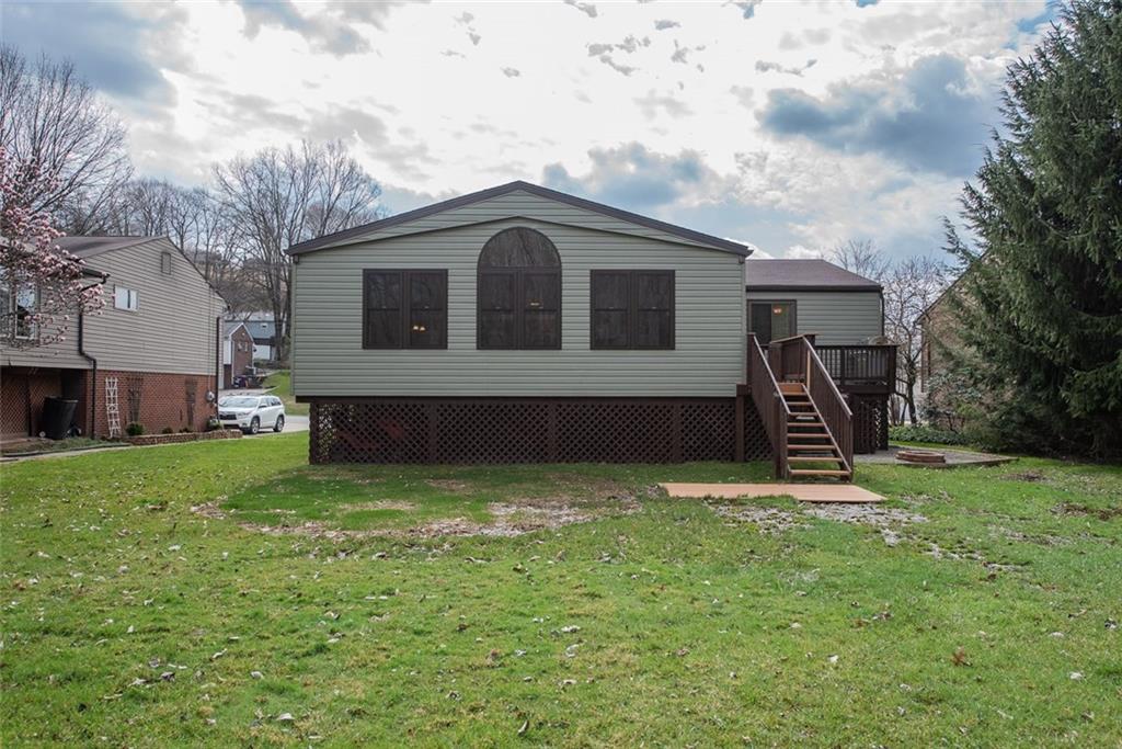 1657 O'Block Road Pittsburgh, PA 15239 - Photo 21 of 24 The side porch is the perfect spot for your grill and evening fires around the fire pit.