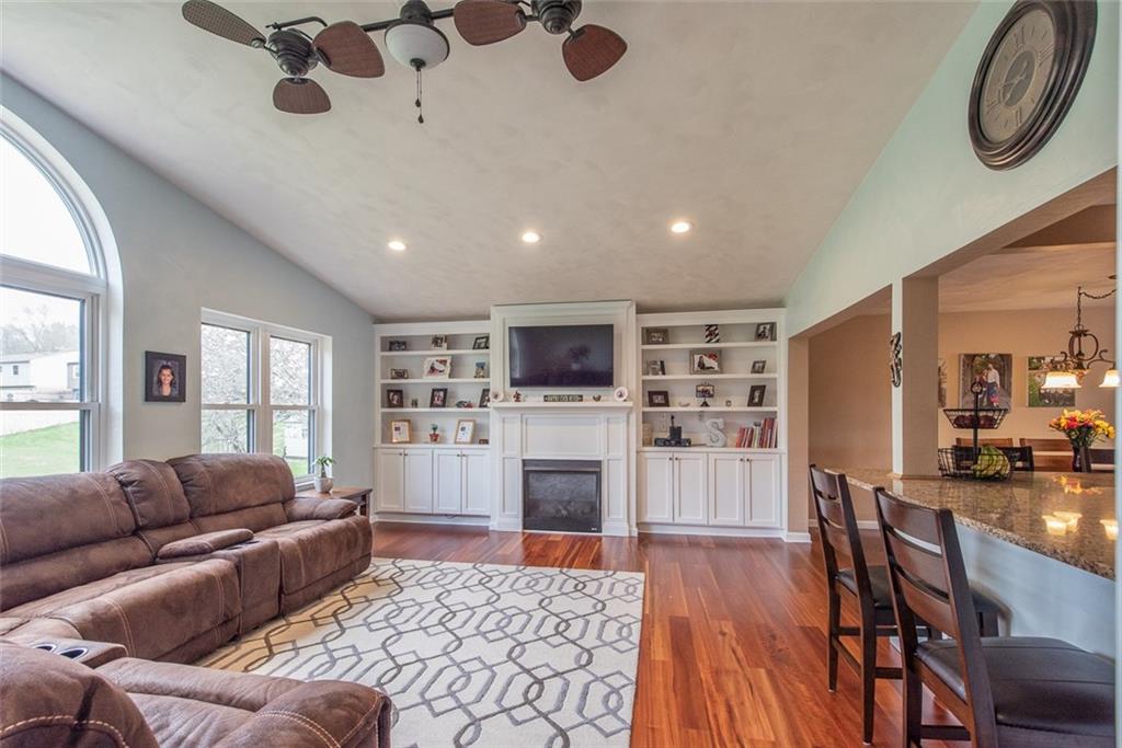 The new addition features built-in bookshelves and a gas fireplace.