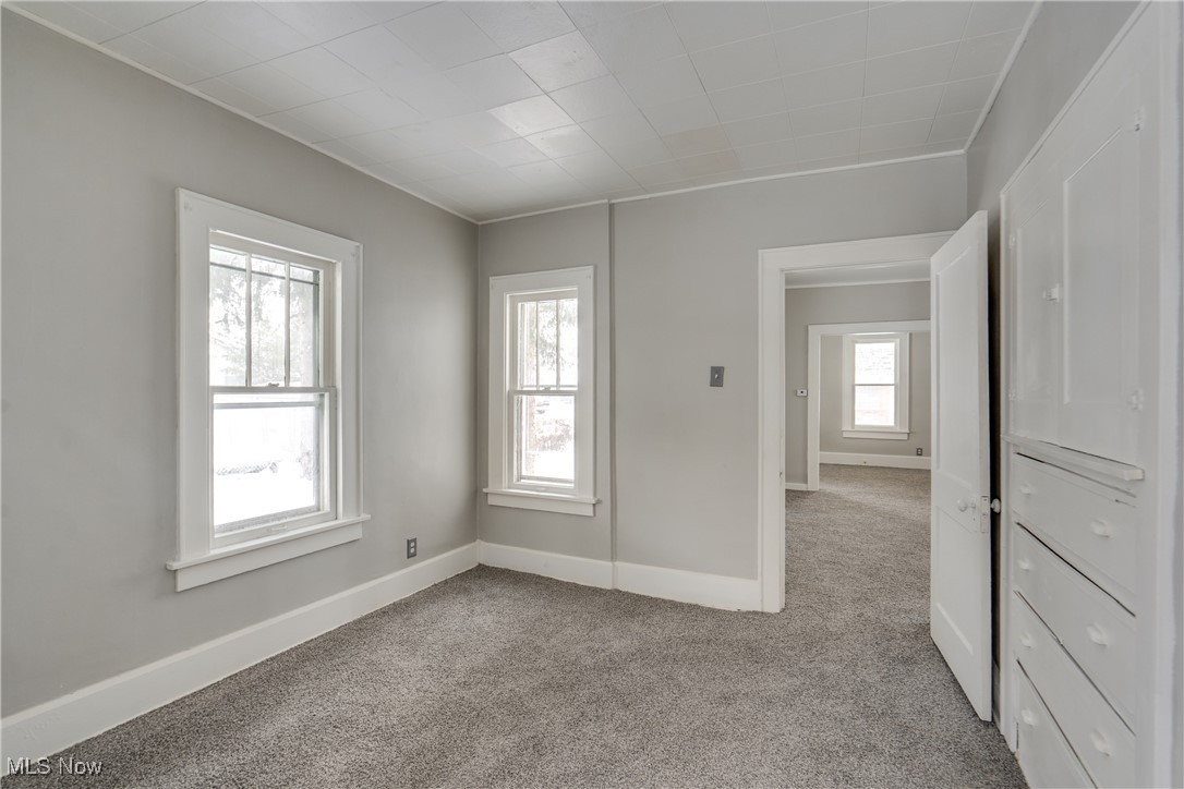 46 Rosenberry Street Alliance, OH 44601 - Photo 16 of 39 Empty room featuring light colored carpet and baseboards
