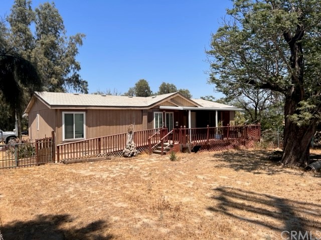 19476 El Rivino Road Jurupa Valley, CA 92509 - Photo 1 of 1 a view of a house with a yard covered in snow