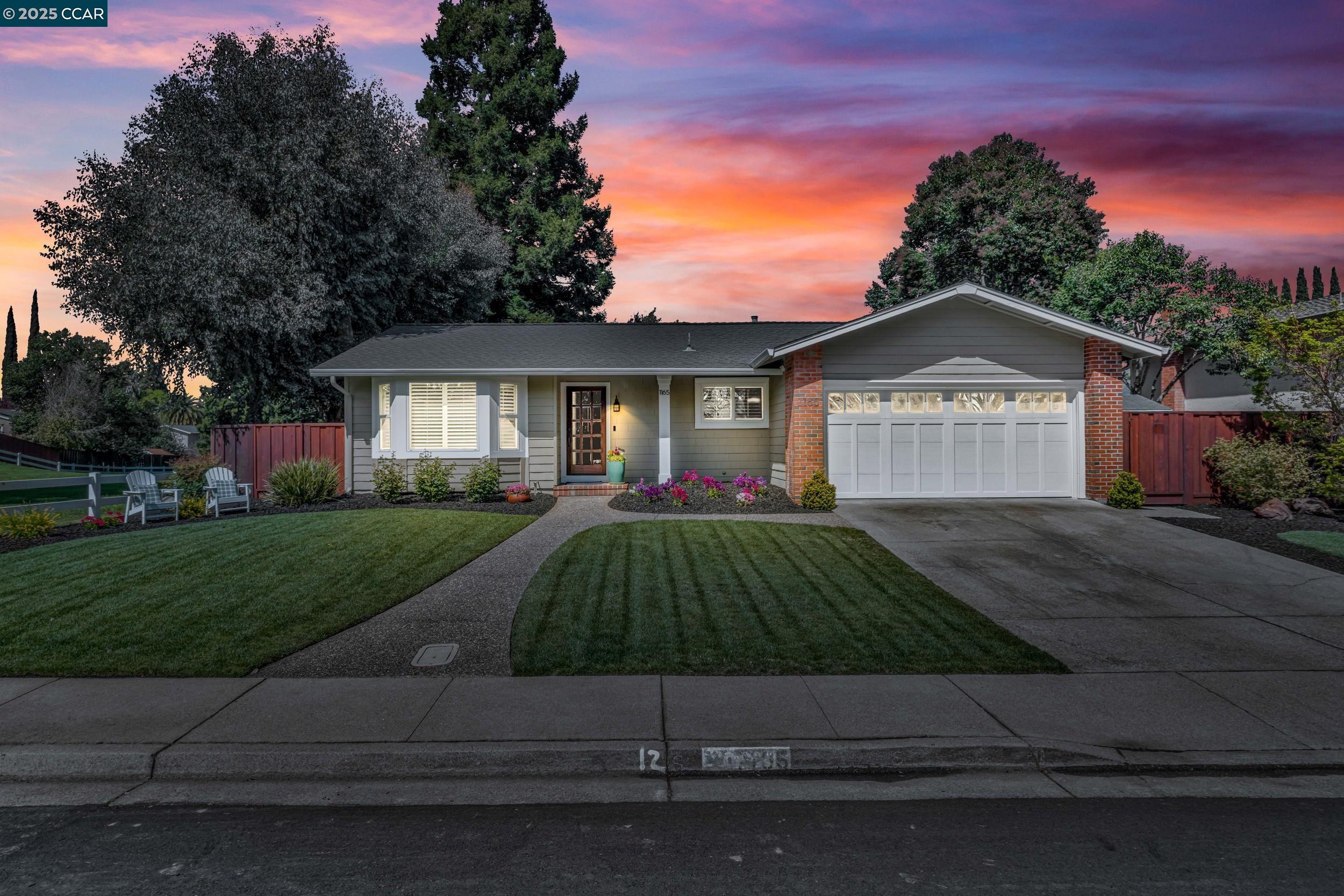 1165 Delta Way Danville, CA 94526 - Photo 1 of 1 a front view of a house with a yard