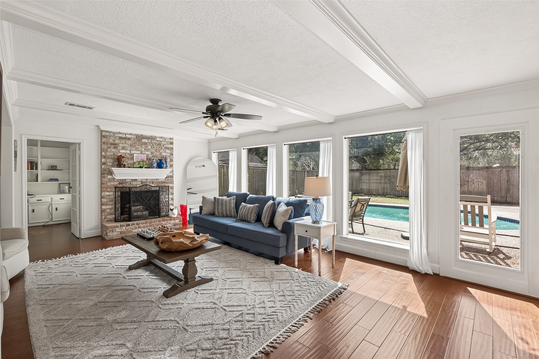15843 Foxgate Road Houston, TX 77079 - Photo 12 of 49 a living room with furniture and a fireplace