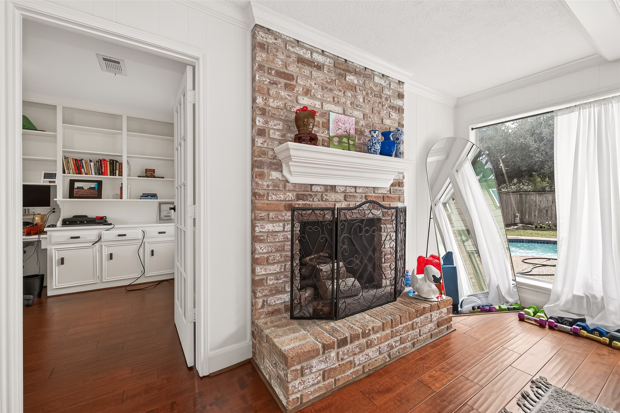 15843 Foxgate Road Houston, TX 77079 - Photo 13 of 49 a living room with furniture and a fireplace