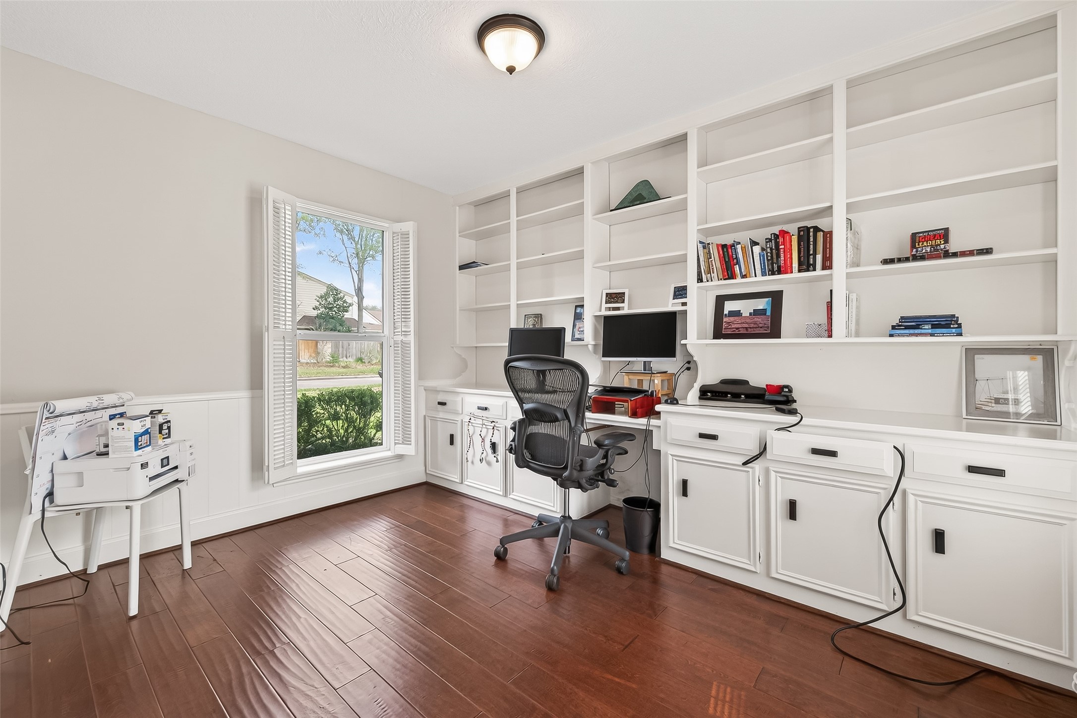 15843 Foxgate Road Houston, TX 77079 - Photo 14 of 49 a view of a workspace with furniture and a window