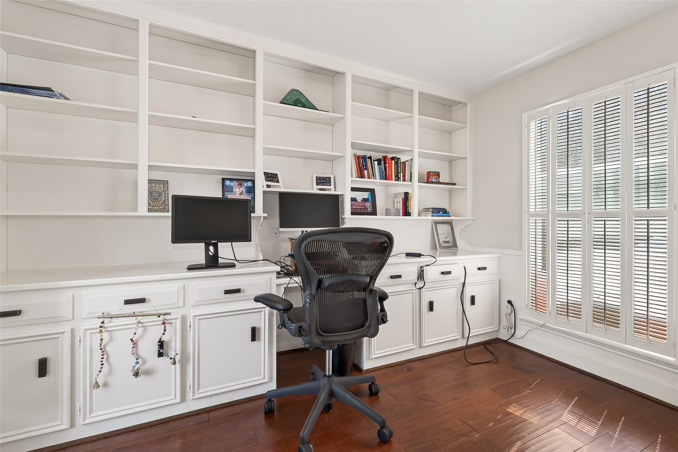 15843 Foxgate Road Houston, TX 77079 - Photo 15 of 49 a view of a workspace with furniture and a window