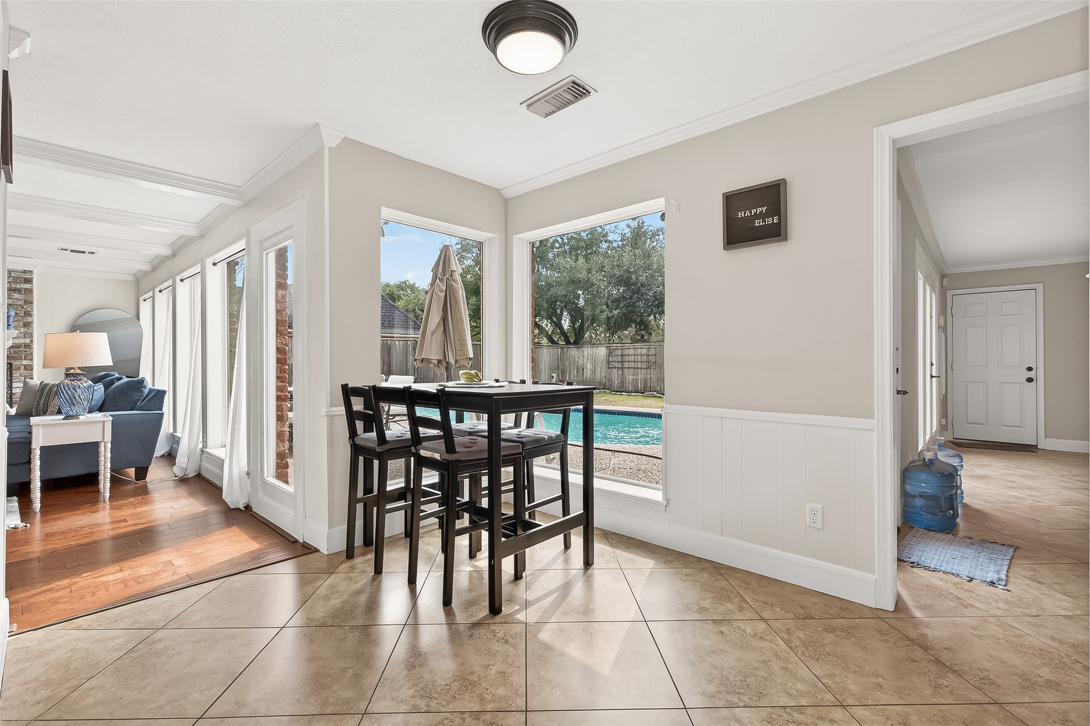 15843 Foxgate Road Houston, TX 77079 - Photo 18 of 49 a view of a dining room with furniture and a potted plant