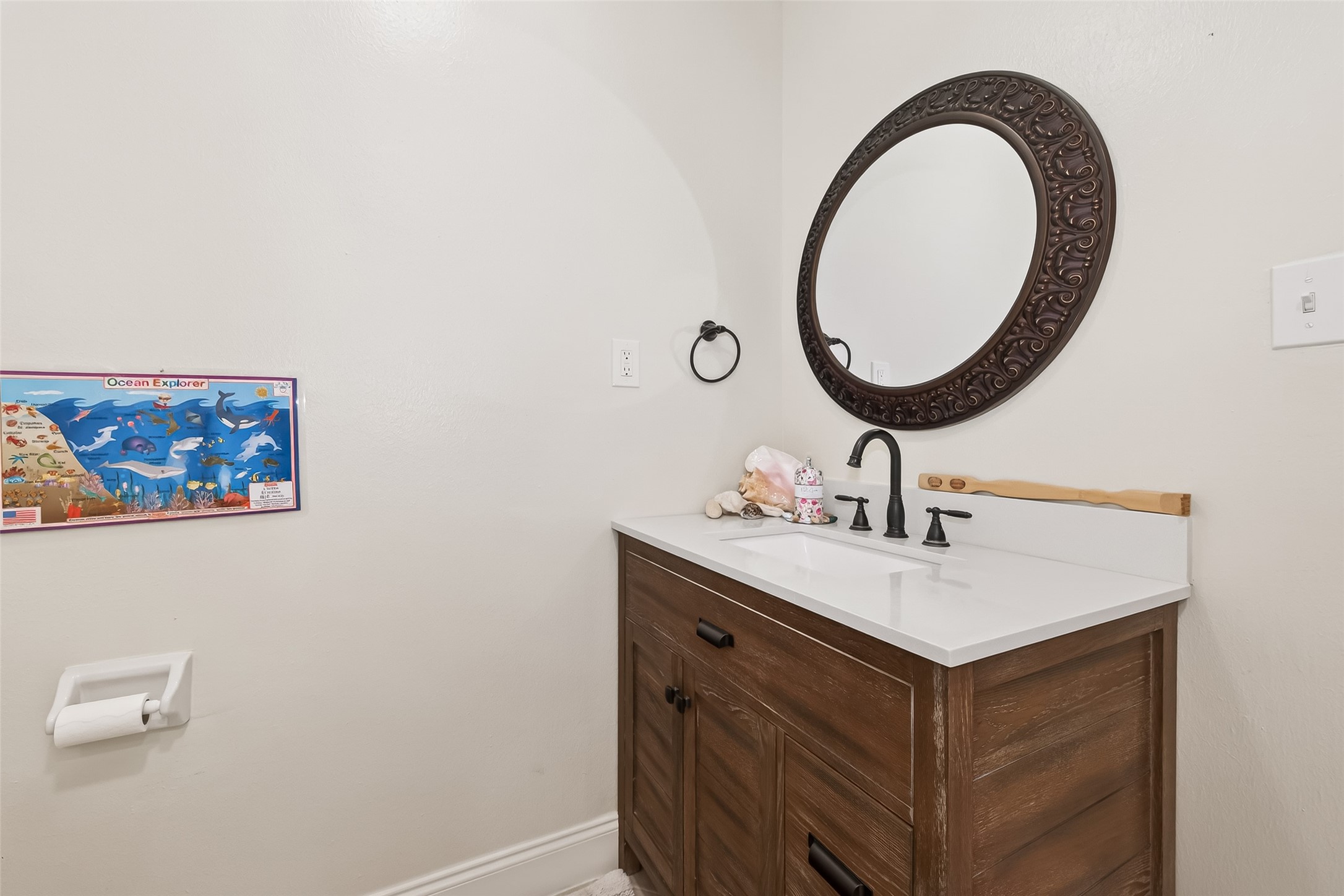 15843 Foxgate Road Houston, TX 77079 - Photo 27 of 49 a bathroom with a sink and a mirror