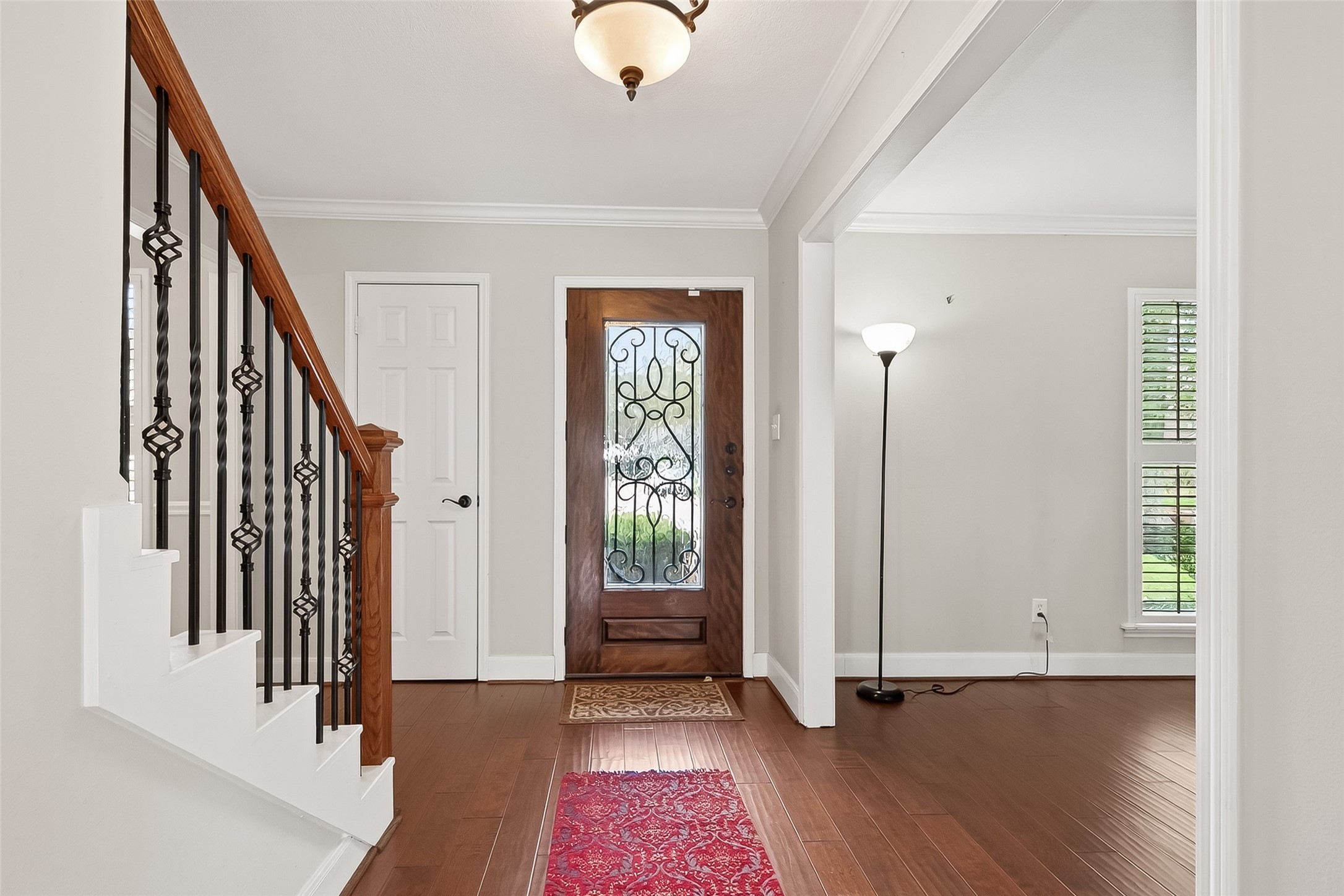 15843 Foxgate Road Houston, TX 77079 - Photo 5 of 49 a view of an entryway with wooden floor
