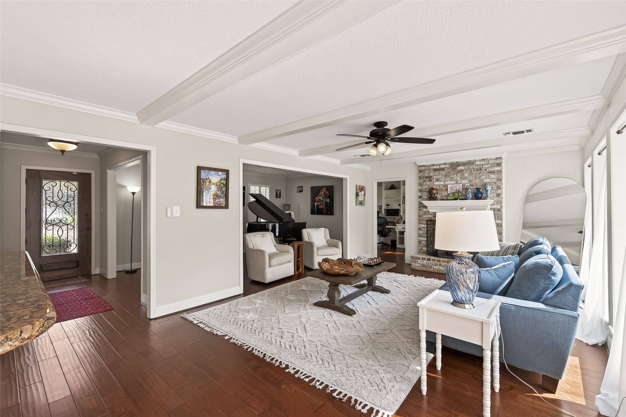 15843 Foxgate Road Houston, TX 77079 - Photo 9 of 49 a living room with furniture and a large window