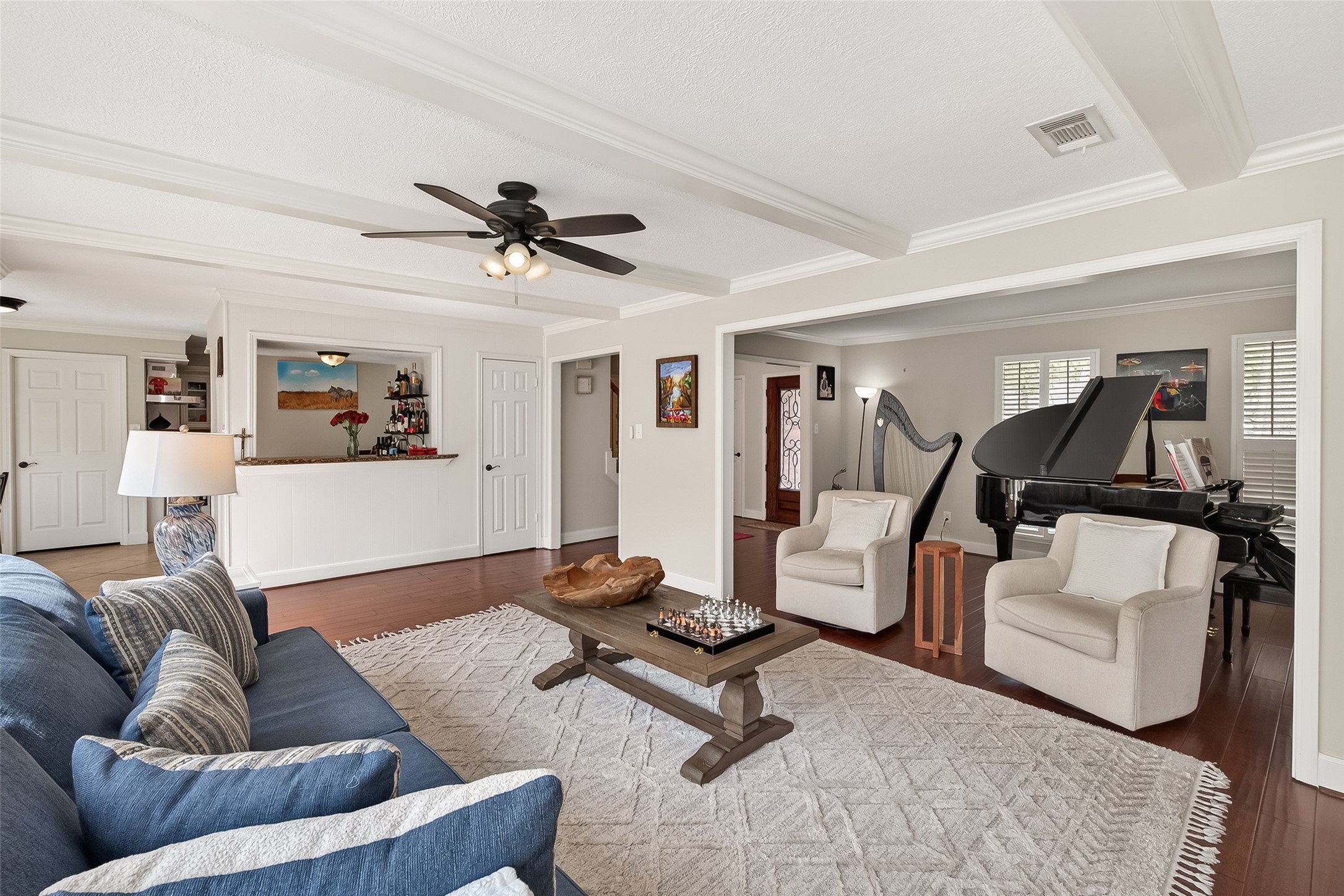 15843 Foxgate Road Houston, TX 77079 - Photo 10 of 49 a living room with furniture and a wooden floor