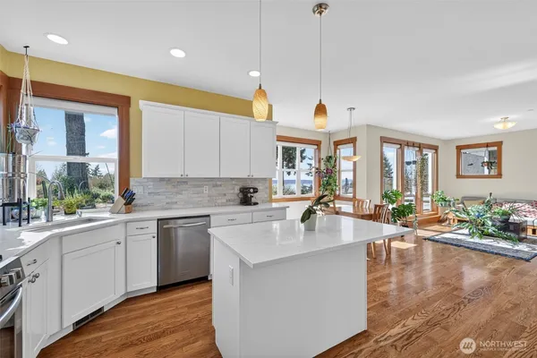 a very nice looking kitchen with a large window