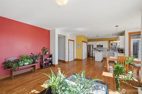 a living room with furniture and a table