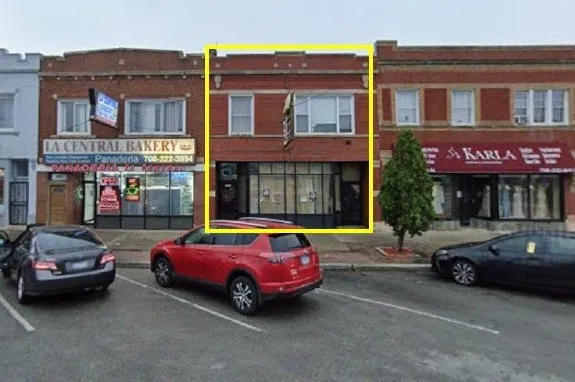 a car parked in front of a building