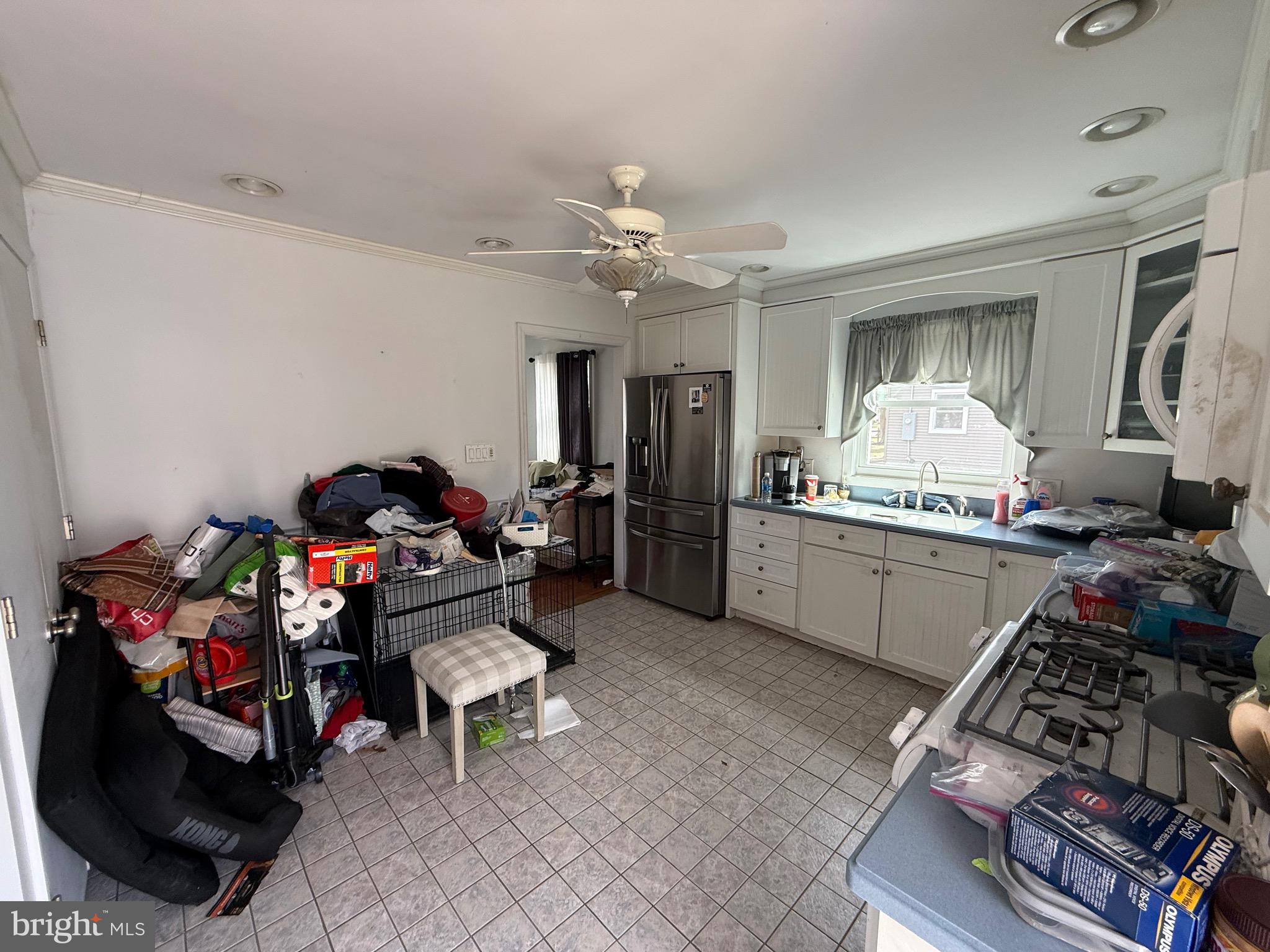 310 Timberline Drive Mount Laurel, NJ 08054 - Photo 11 of 15 a living room with furniture and a chandelier