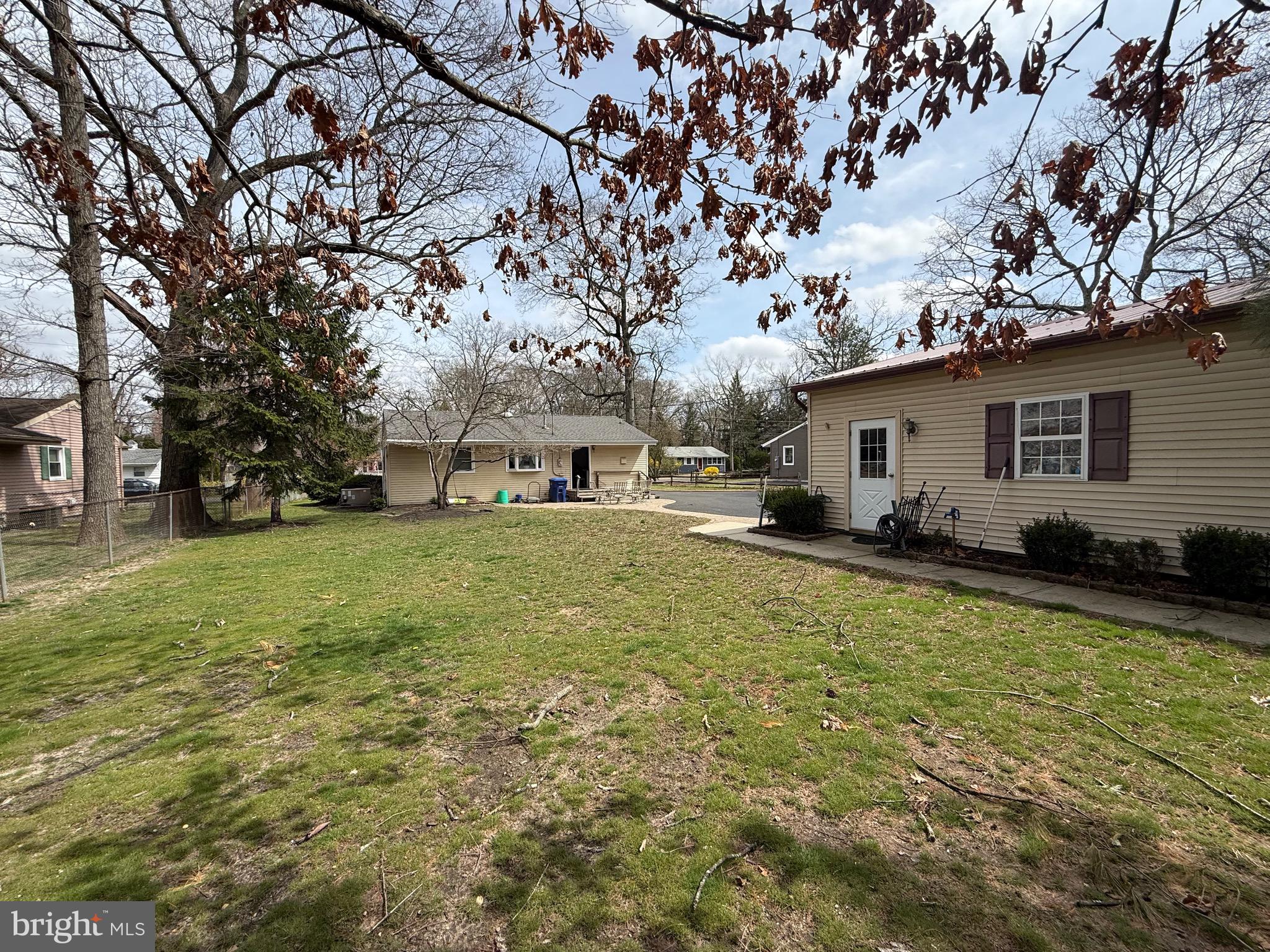 310 Timberline Drive Mount Laurel, NJ 08054 - Photo 2 of 15 a front view of house with yard and trees around