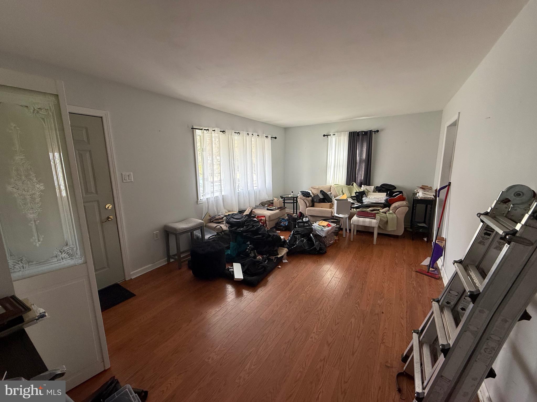 310 Timberline Drive Mount Laurel, NJ 08054 - Photo 5 of 15 a living room with furniture and a flat screen tv