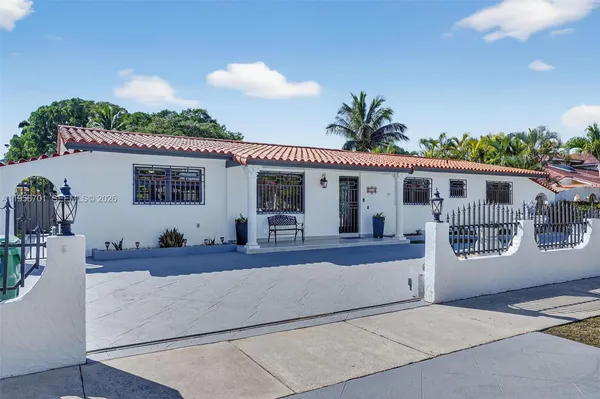 a front view of a house with a porch