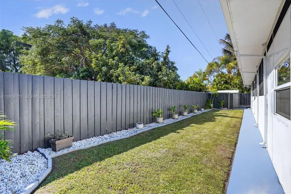 a view of backyard with green space