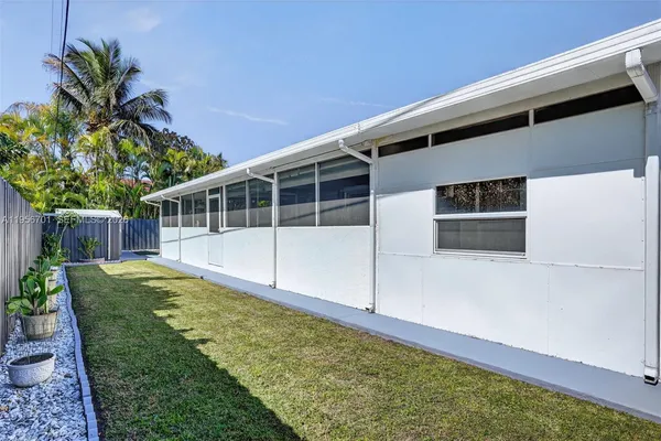 a view of porch with wooden floor and fence