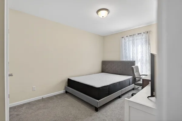 a view of a balcony with furniture