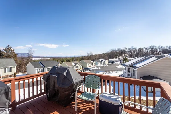a balcony view with a glass door