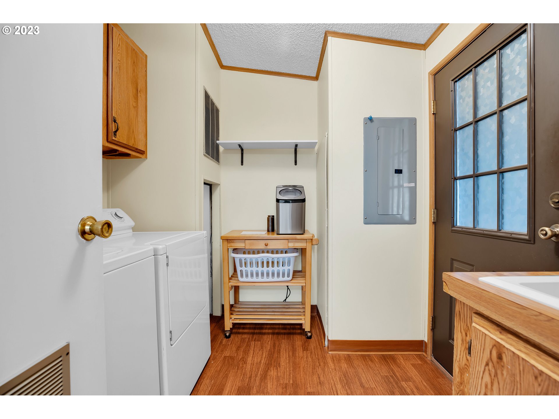 4304 Settlers Loop Forest Grove, OR 97116 - Photo 19 of 45 a kitchen with a refrigerator and a stove