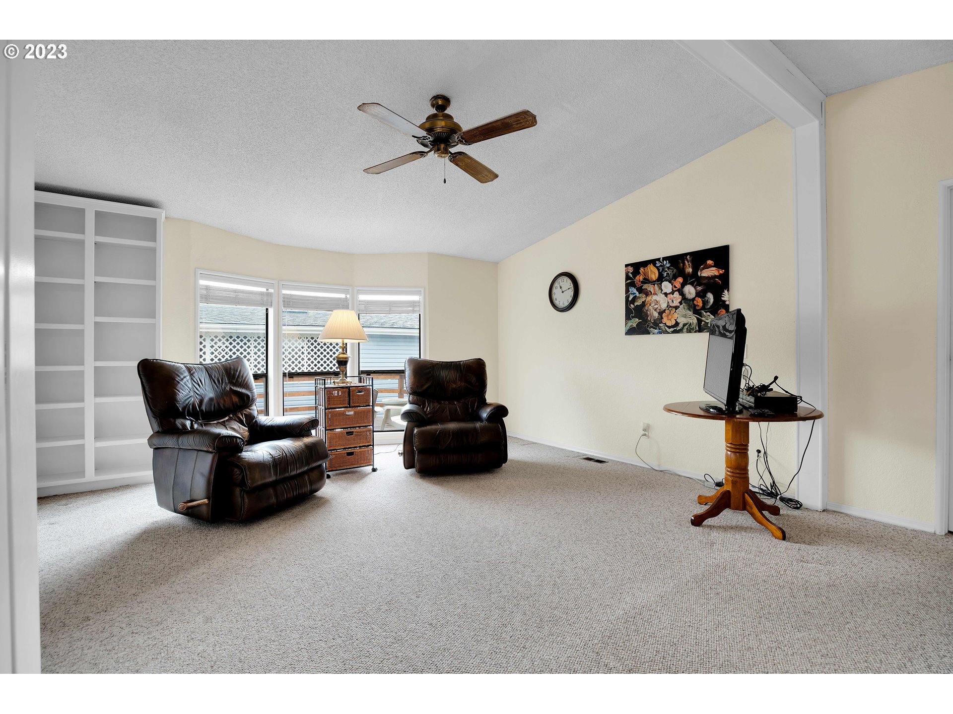 4304 Settlers Loop Forest Grove, OR 97116 - Photo 23 of 45 a living room with furniture and a window