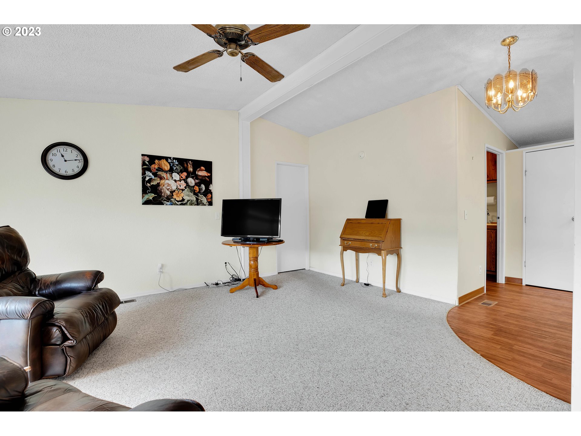 4304 Settlers Loop Forest Grove, OR 97116 - Photo 24 of 45 a living room with furniture and a flat screen tv