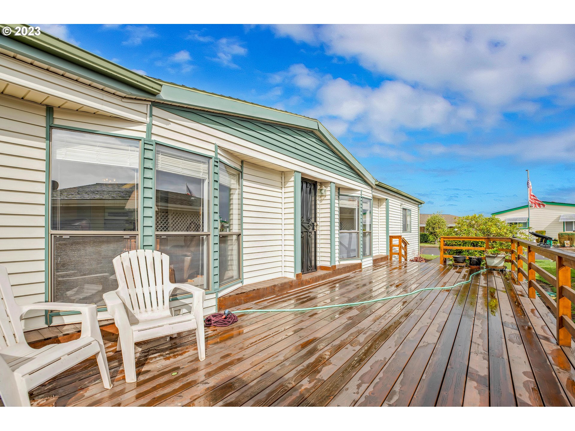 4304 Settlers Loop Forest Grove, OR 97116 - Photo 3 of 45 a view of a chairs and table on the deck