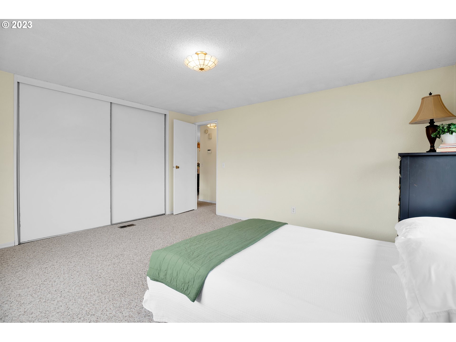 4304 Settlers Loop Forest Grove, OR 97116 - Photo 33 of 45 a bedroom with a bed and ceiling fan