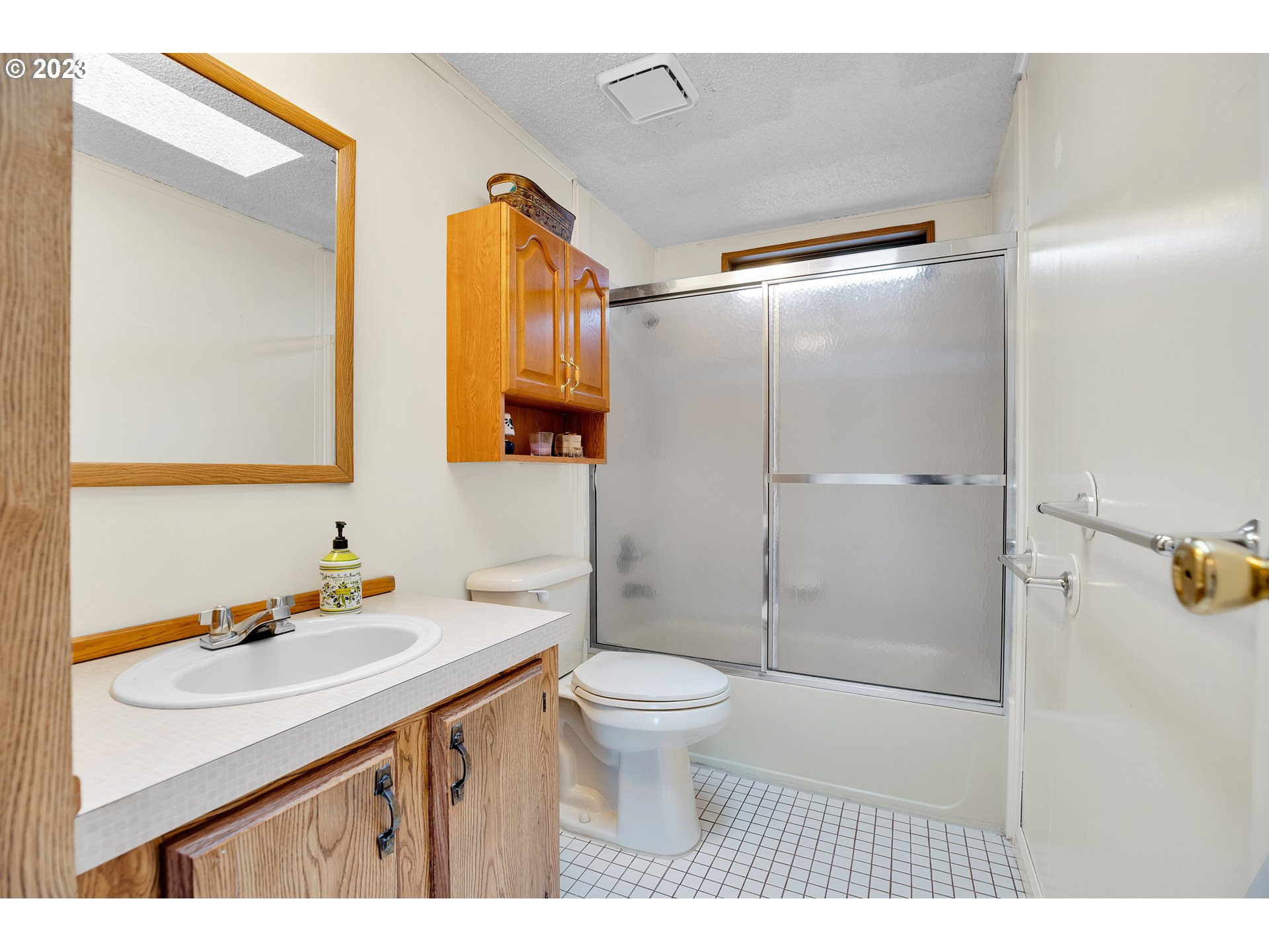 4304 Settlers Loop Forest Grove, OR 97116 - Photo 34 of 45 a bathroom with a sink toilet and shower