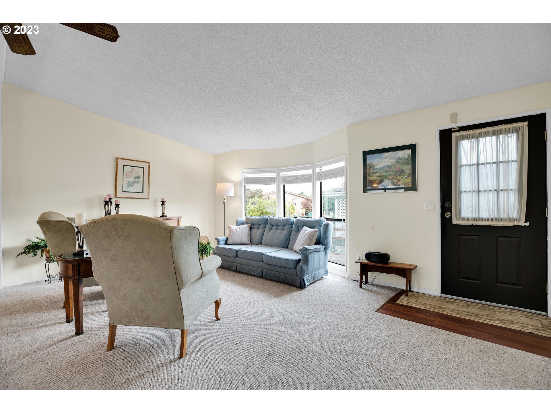 4304 Settlers Loop Forest Grove, OR 97116 - Photo 5 of 45 a living room with furniture and a window