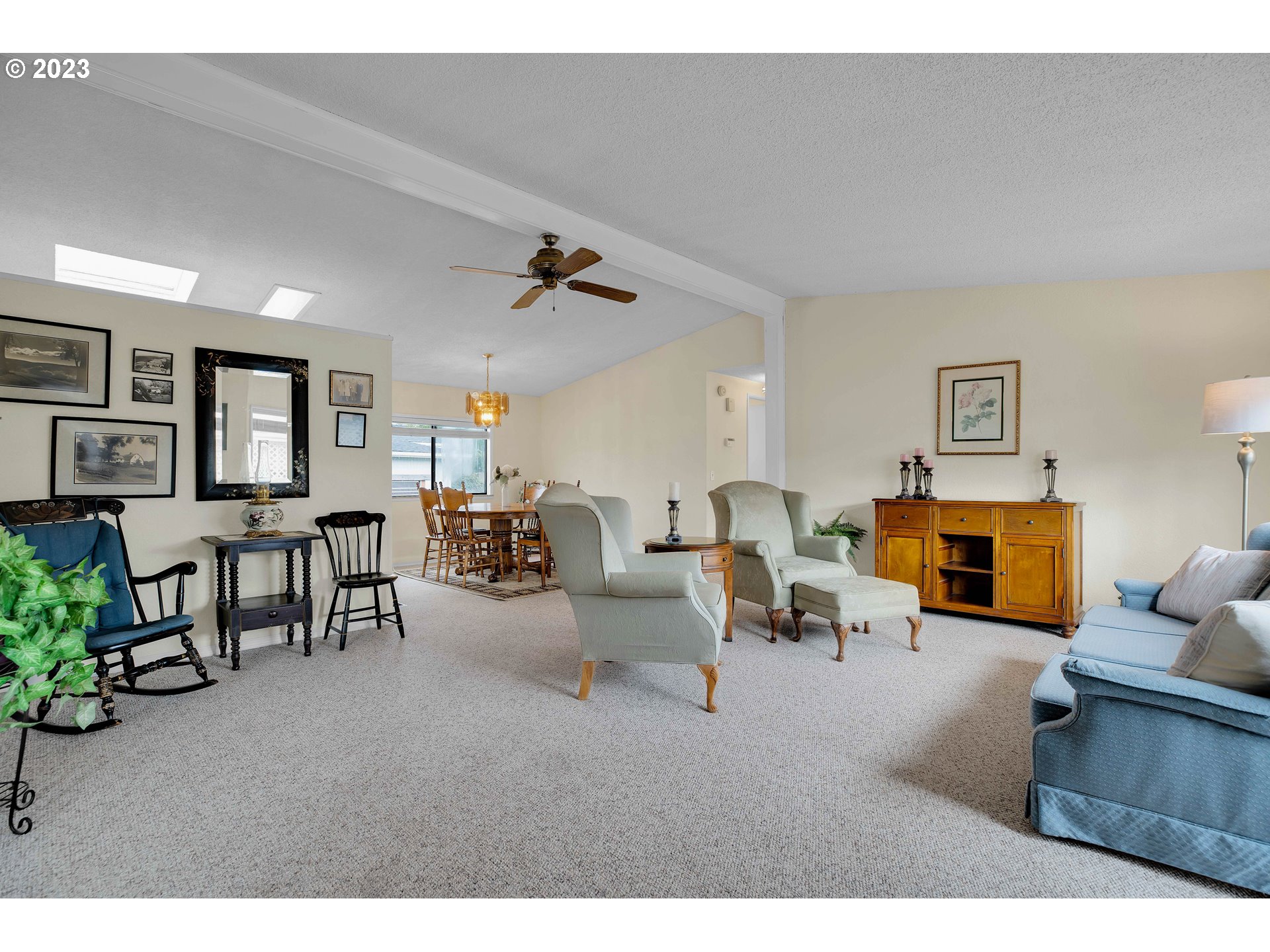 4304 Settlers Loop Forest Grove, OR 97116 - Photo 7 of 45 a living room with furniture and a large window