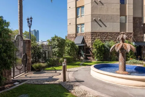 a view of street with tall buildings