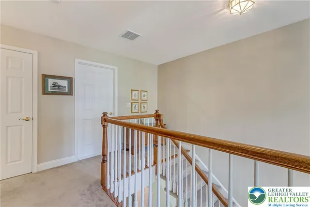 a bathroom with a sink a toilet and shower curtain