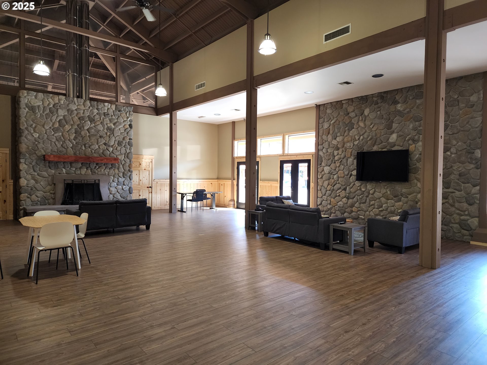 65000 Highway 26, Unit WFB50 Welches, OR 97067 - Photo 24 of 30 a view of a livingroom with furniture and a fireplace