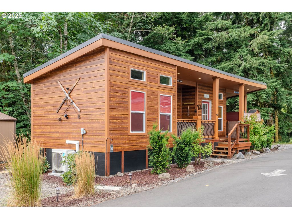 65000 Highway 26, Unit WFB50 Welches, OR 97067 - Photo 3 of 30 a front view of a house with a yard