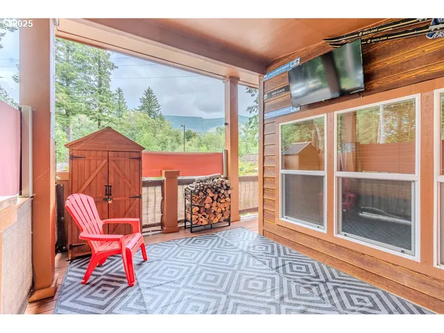 a outdoor living space with patio furniture and a window