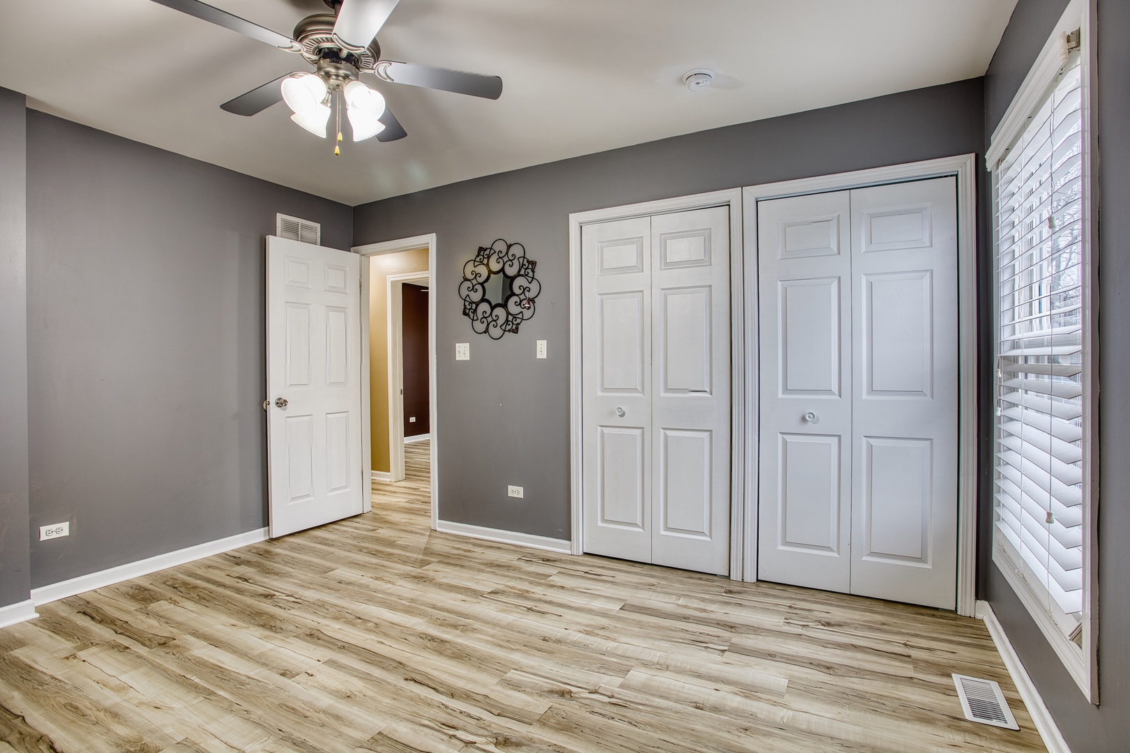 805 Stowell Avenue Streamwood, IL 60107 - Photo 11 of 30 a view of a livingroom with a chandelier fan