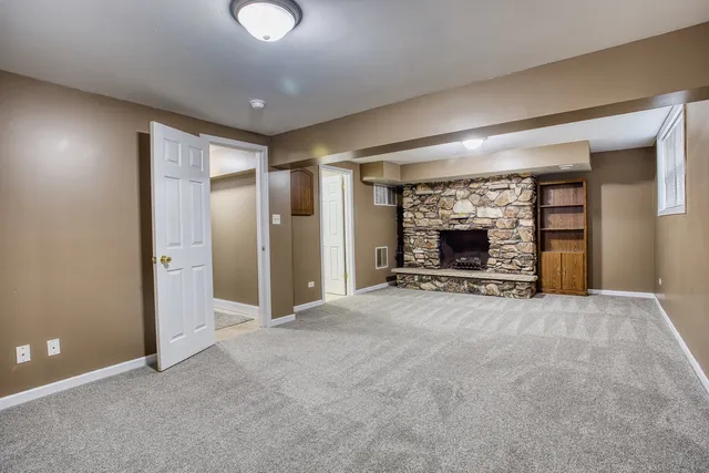 a view of a livingroom with a fireplace