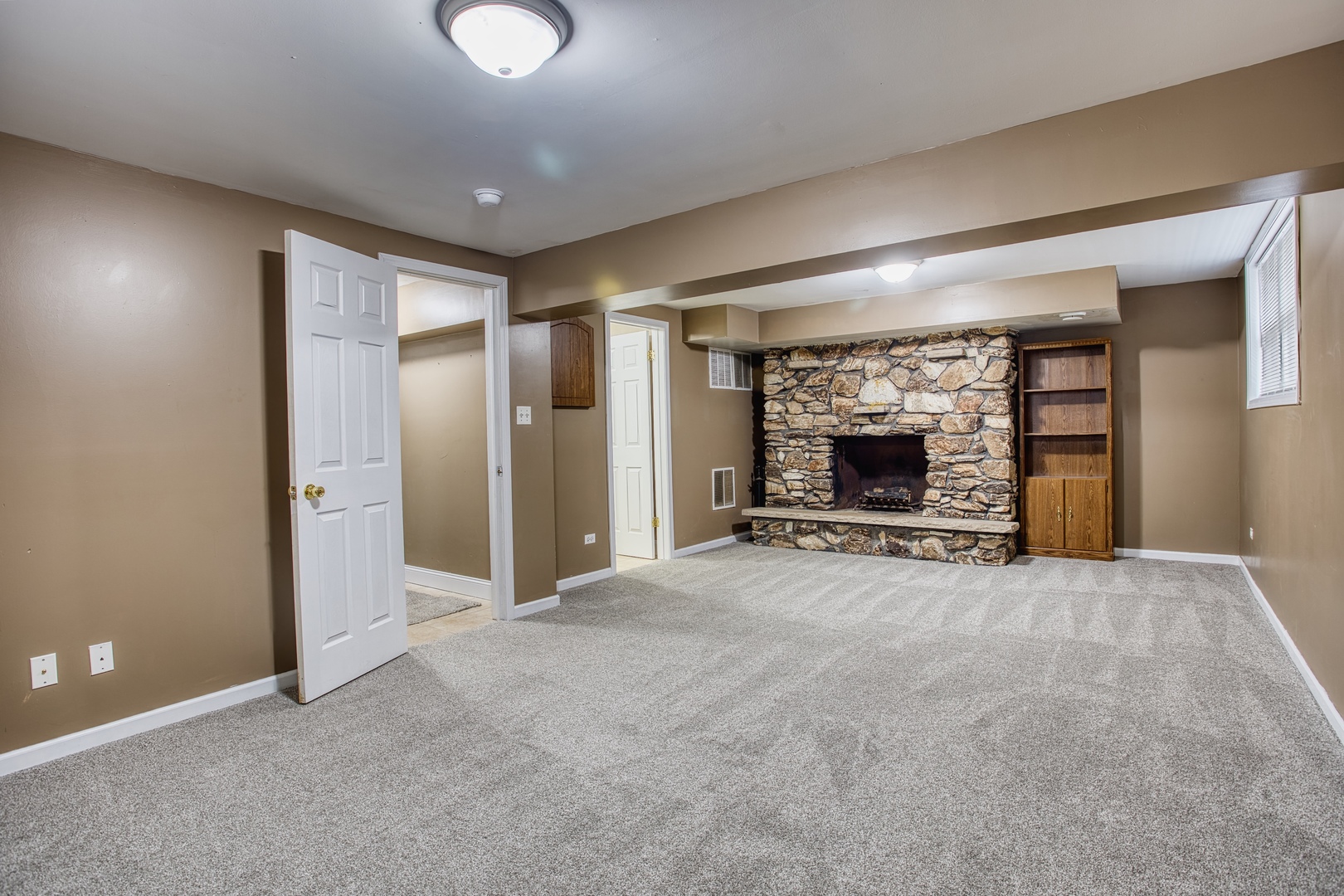 805 Stowell Avenue Streamwood, IL 60107 - Photo 19 of 30 a view of a livingroom with a fireplace