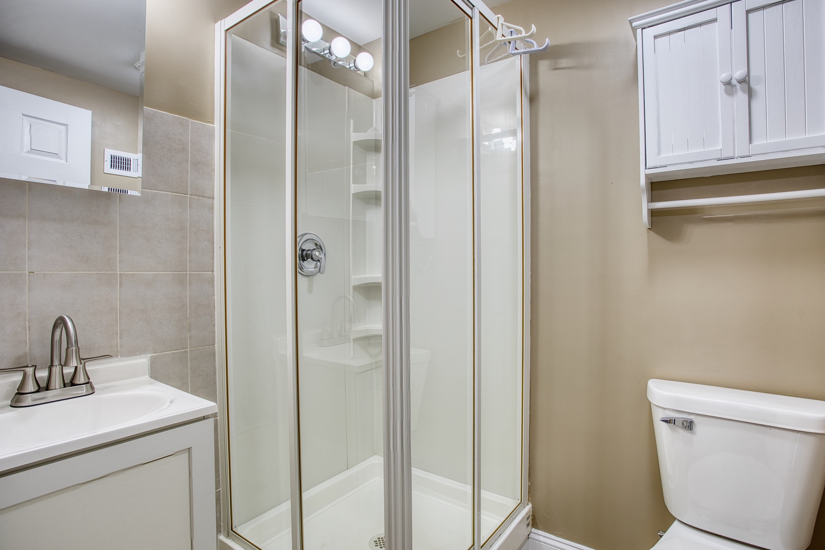 805 Stowell Avenue Streamwood, IL 60107 - Photo 21 of 30 a bathroom with a granite countertop sink toilet and shower