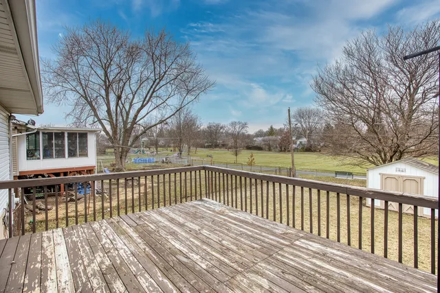 a view of a house with a roof deck