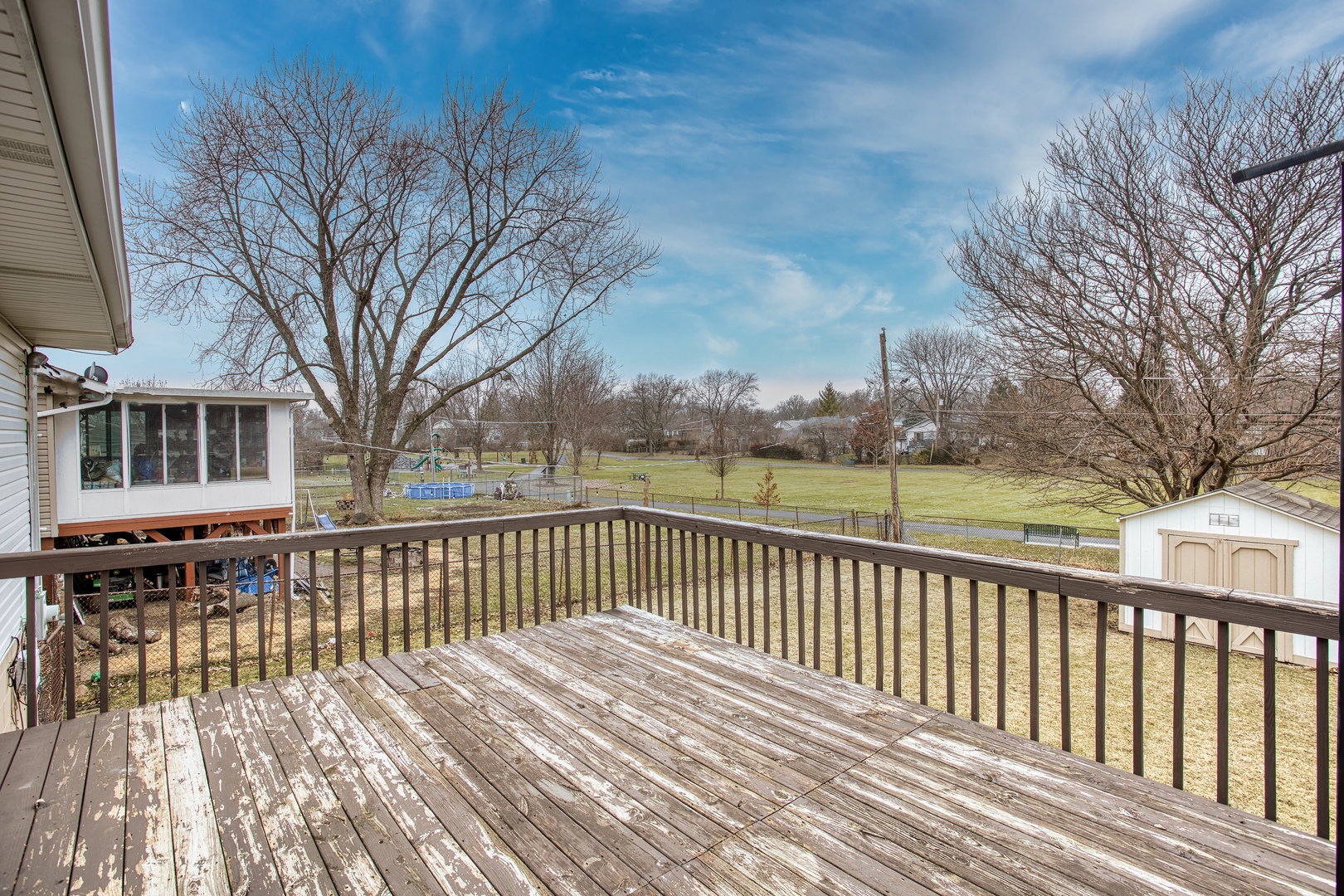 805 Stowell Avenue Streamwood, IL 60107 - Photo 26 of 30 a view of a house with a roof deck