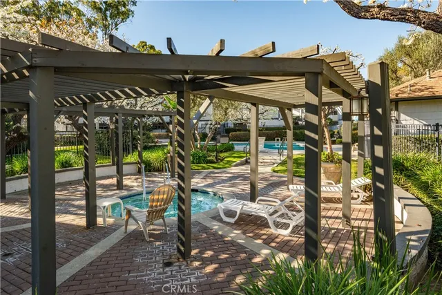 a view of a pathway with a tree