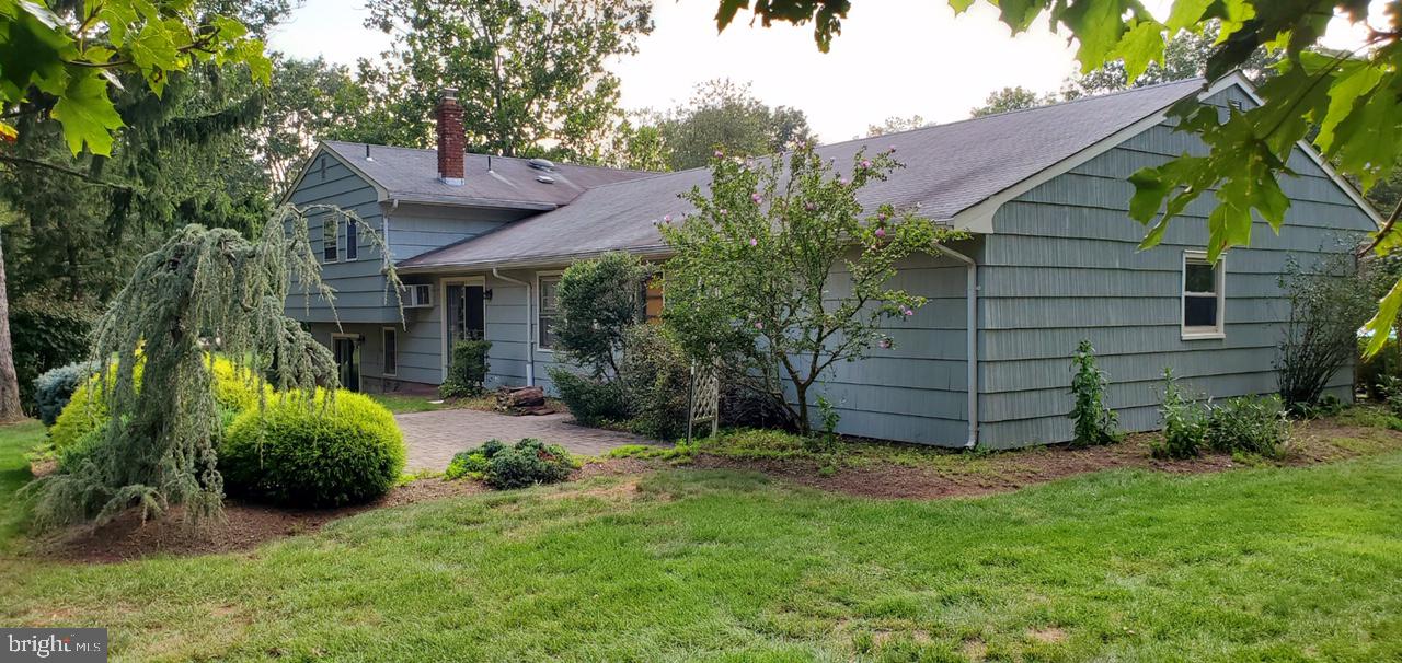 19 Jamestown Road Belle Mead, NJ 08502 - Photo 28 of 30 View of patio and house in Summer