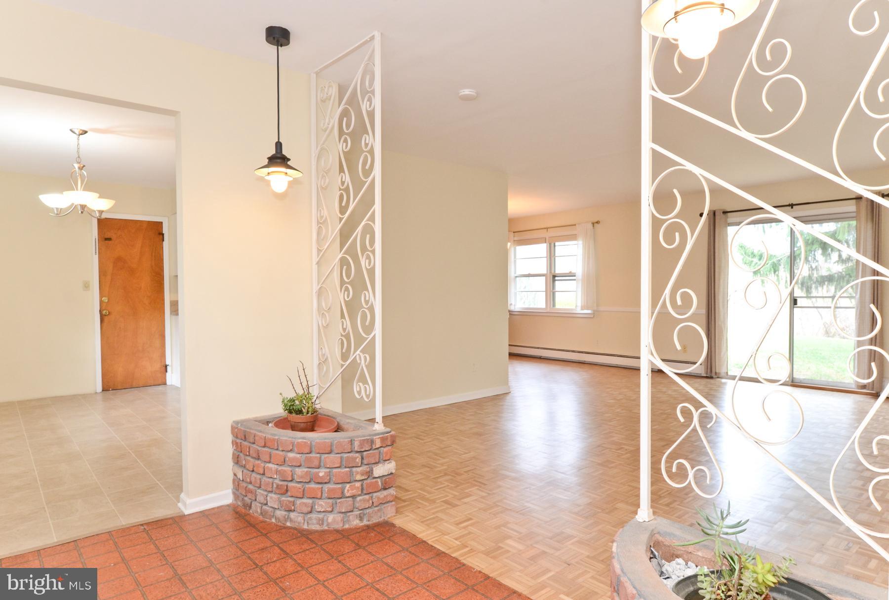 19 Jamestown Road Belle Mead, NJ 08502 - Photo 7 of 30 Foyer to LR/DR & Breakfast Rm