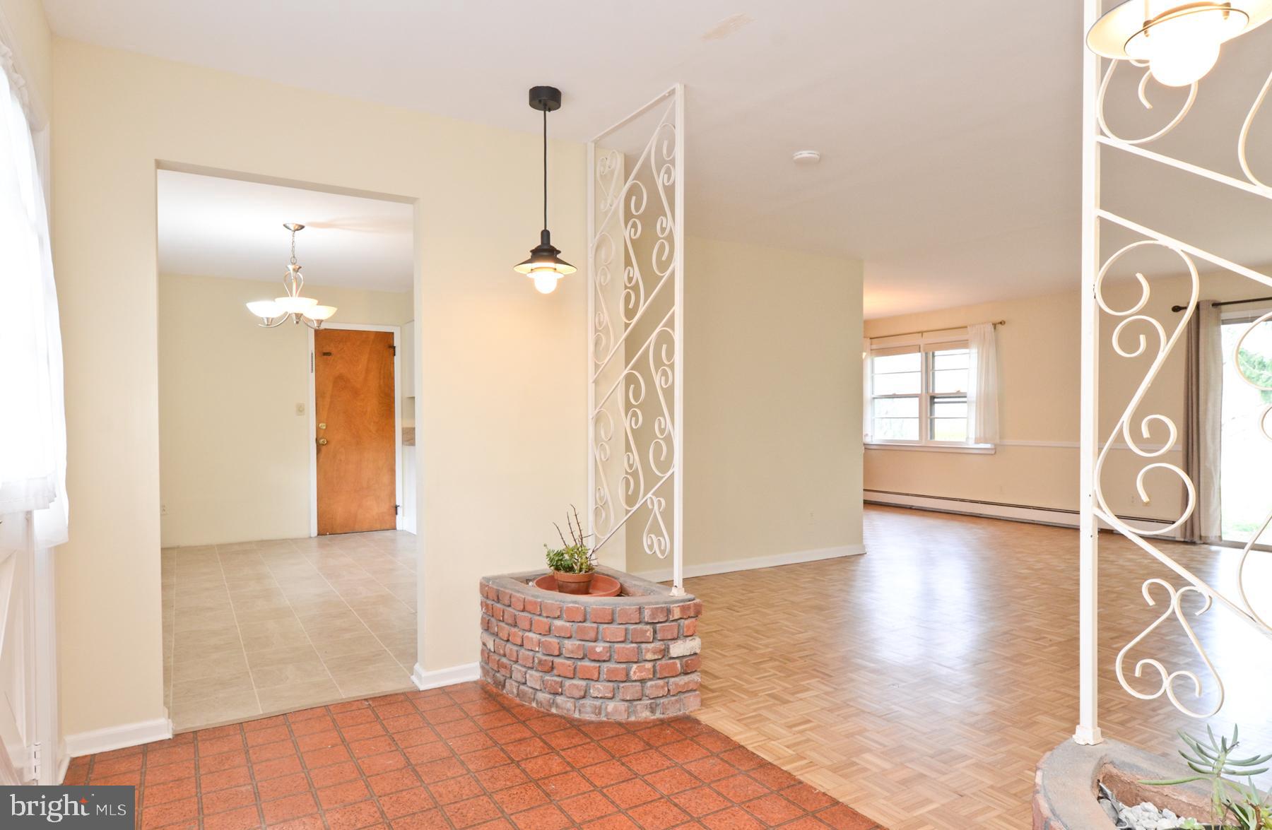 19 Jamestown Road Belle Mead, NJ 08502 - Photo 8 of 30 Foyer to LR/DR & Breakfast Rm