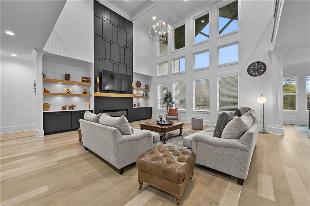 2550 Kilgore Road Buford, GA 30519 - Photo 15 of 64 a living room with furniture and a fireplace