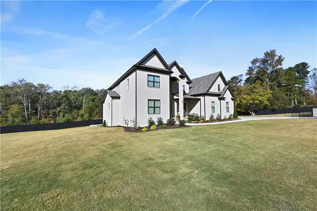 a view of a dining room with furniture and window
